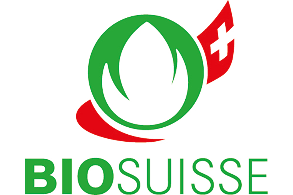 Das Bild zeigt das Signet des Dachverbandes der Schweizer Knospe-Betriebe und Eigentümerin der eingetragenen Marke Knospe.